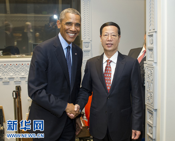 9月23日，國家主席習(xí)近平特使、國務(wù)院副總理張高麗在紐約會見出席聯(lián)合國氣候峰會的美國總統(tǒng)奧巴馬。 新華社記者王曄攝