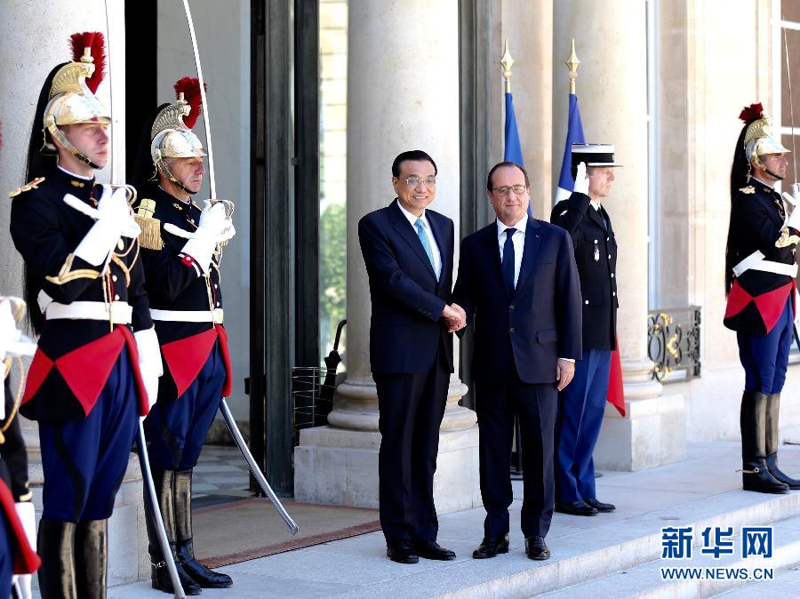 當地時間6月30日下午，中國國務院總理李克強在巴黎愛麗舍宮會見法國總統奧朗德。 新華社記者馬占成攝 