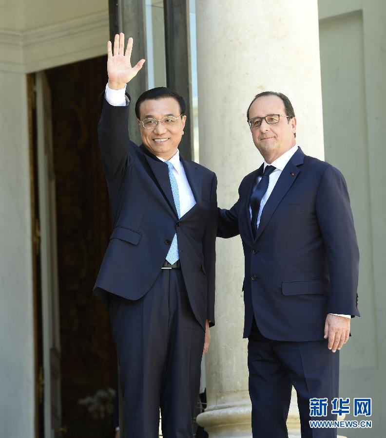 當地時間6月30日下午，中國國務院總理李克強在巴黎愛麗舍宮會見法國總統奧朗德。 新華社記者李學仁攝 