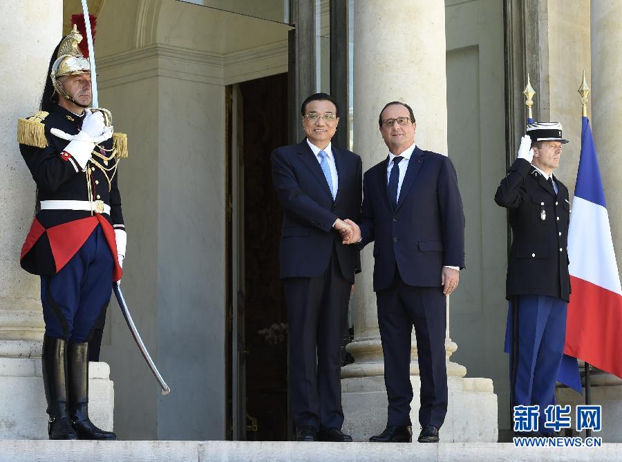 當地時間6月30日下午，國務院總理李克強在巴黎愛麗舍宮會見法國總統奧朗德。 新華社記者李學仁攝
